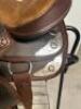 DESCRIPTION 13" BROWN AND SILVER LEATHER WESTERN SADDLE. COMES W/ BRIDAL, CINCH, STIRRUPS, AND SADDLE PAD. ADDITIONAL INFORMATION NEW IN THE BOX. SIZE - 5