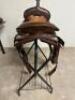 DESCRIPTION 13" BROWN AND SILVER LEATHER WESTERN SADDLE. COMES W/ BRIDAL, CINCH, STIRRUPS, AND SADDLE PAD. ADDITIONAL INFORMATION NEW IN THE BOX. SIZE - 6