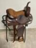 DESCRIPTION 13" BROWN AND SILVER LEATHER WESTERN SADDLE. COMES W/ BRIDAL, CINCH, STIRRUPS, AND SADDLE PAD. ADDITIONAL INFORMATION NEW IN THE BOX. SIZE - 7