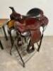 DESCRIPTION 17" LEATHER WESTERN SADDLE W/ STIRRUPS. ( USED ) NO TACK INCLUDED ADDITIONAL INFORMATION USED IN THE BOC SIZE 17" LOCATION BAY 6 QTY 1 - 2