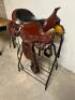 DESCRIPTION 17" LEATHER WESTERN SADDLE W/ STIRRUPS. ( USED ) NO TACK INCLUDED ADDITIONAL INFORMATION USED IN THE BOC SIZE 17" LOCATION BAY 6 QTY 1 - 6