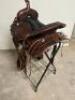 DESCRIPTION 17" LEATHER WESTERN SADDLE. COMES WITH CINCH AND STIRRUPS ADDITIONAL INFORMATION USED IN THE BOC SIZE 17" LOCATION BAY 6 QTY 1 - 3