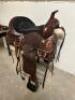 DESCRIPTION 17" LEATHER WESTERN SADDLE. COMES WITH CINCH AND STIRRUPS ADDITIONAL INFORMATION USED IN THE BOC SIZE 17" LOCATION BAY 6 QTY 1 - 6