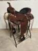 DESCRIPTION 13" BROWN AND SILVER LEATHER WESTERN SADDLE. USED ADDITIONAL INFORMATION USED IN THE BOC SIZE 13" LOCATION BAY 6 QTY 1