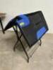 DESCRIPTION WESTERN STYLE BLACK AND BLUE SADDLE PAD. ADDITIONAL INFORMATION NEW W/ PACKAGING SIZE 35" X 31" LOCATION BAY 6 QTY 1 - 2