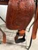 DESCRIPTION 13" WESTERN STYLE LEATHER SADDLE IN CHUNNEL. COMES W/ STIRRUPS. BRAND / MODEL: JD IMPORTS AS2401 ADDITIONAL INFORMATION NEW IN THE BOX. SI - 4