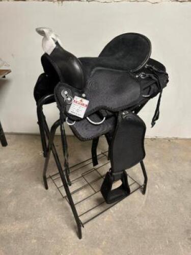 DESCRIPTION 16" WESTER STYLE SYNTHETIC SADDLE W/ PAD, REINS, STIRRUPS, AND CINCH. BRAND / MODEL: KRISHNA KS2203 ADDITIONAL INFORMATION NEW IN THE BOX.