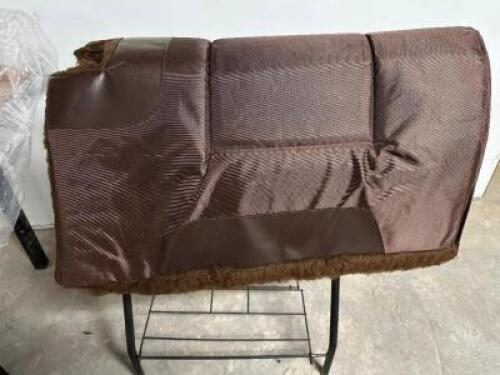 DESCRIPTION (2) WESTERN STYLE BROWN SADDLE PAD. ADDITIONAL INFORMATION NEW W/ PACKAGING THIS LOT IS: SOLD BY THE PIECE SIZE 35" X 31" LOCATION BAY 6 Q