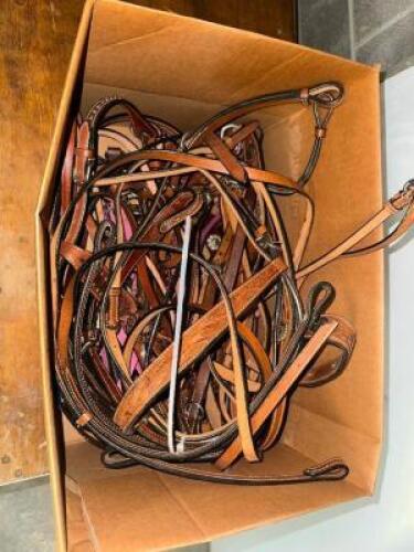 DESCRIPTION BOX OF ASSORTED LEATHER BRIDALS AND TACK. THIS LOT IS: ONE MONEY LOCATION BAY 6