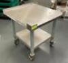 24" X 24" X 25" LOW BOY STAINLESS EQUIPMENT STAND W/ 1" BACK SPLASH.
