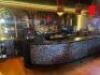 DESCRIPTION 200" X 26" BLACK COMPOSITE BAR TOP WITH WOODEN TRIM, CAST IRON FOOT RAIL, AND WOODEN ARCH BAR BACK. ADDITIONAL INFORMATION LOGO MIRROR IS - 2