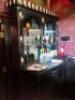 DESCRIPTION 20.5' X 8' " U SHAPED " BLACK STONE BAR TOP WITH WOODEN PANEL FRONT AND BAR RAIL. ADDITIONAL INFORMATION BAR TOP COMES IN 6' TO 8' SECTION - 8