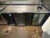 DESCRIPTION TRUE 69" TWO GLASS DOOR BACK BAR COOLER. 2014 BRAND / MODEL: TRUE TBB-3G ADDITIONAL INFORMATION SN# 7645408, 115 VOLT, 1 PHASE. IN WORKING - 2