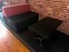 DESCRIPTION (2) SECTION 42" UPHOLSTERED BENCH / BOOTH SEATING W/ (2) 42" X 30" COMPOSITE BLACK TABLE'S ADDITIONAL INFORMATION (4) END CAP SECTIONS. RE - 6