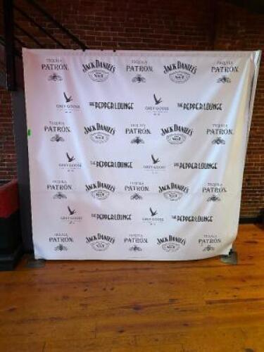 DESCRIPTION (1) SECTION OF PIPE AND DRAPE W/ "THE PEPPER LOUNGE" VINYL BANNER. LOCATION MAIN BAR QTY 1