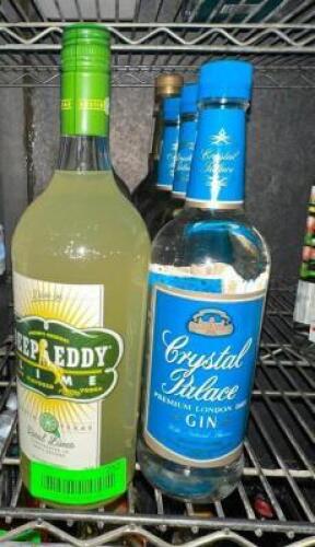 DESCRIPTION (7) ASSORTED BOTTLE OF GIN AND FLAVORED VODKA. THIS LOT IS: SOLD BY THE PIECE LOCATION KITCHEN QTY 7