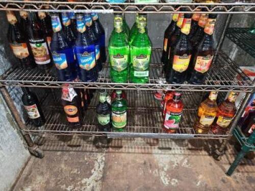 DESCRIPTION CONTENTS OF BOTTOM (2) SHELVES - ASSORTED FLAVOR AND MIXERS. THIS LOT IS: ONE MONEY LOCATION KITCHEN QTY 1