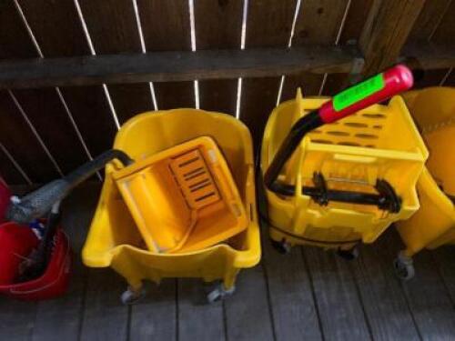 DESCRIPTION (2) YELLOW MOP BUCKETS W/ WRINGERS THIS LOT IS: SOLD BY THE PIECE LOCATION OUTSIDE QTY 2