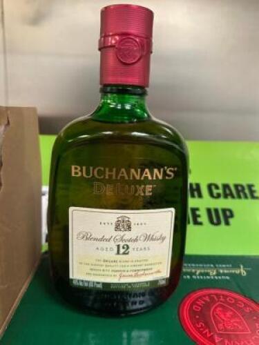 DESCRIPTION (9) BOTTLES OF BUCHANANS DELUXE WHISKEY ADDITIONAL INFORMATION RETAILS FOR $35 PER BOTTLE THIS LOT IS: SOLD BY THE PIECE LOCATION KITCHEN