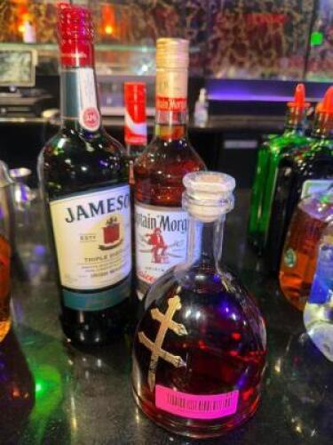 DESCRIPTION (4) ASSORTED BOTTLE OF ALCOHOL = D'USSE, CAPTAIN, JAMESON THIS LOT IS: SOLD BY THE PIECE LOCATION BACK BAR QTY 4