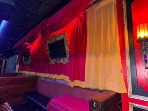 DESCRIPTION RED AND YELLOW 20' FABRIC DRAPE / CURTAIN. LOCATION BACK BAR QTY 1