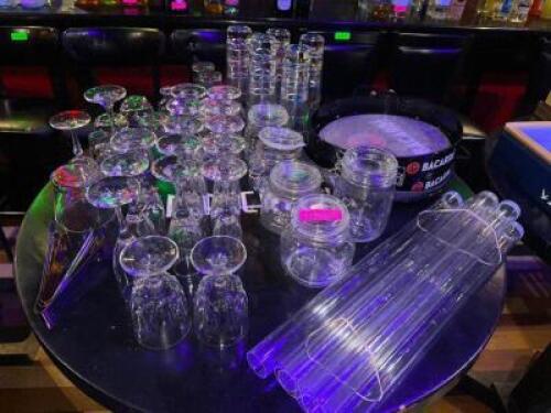 DESCRIPTION CONTENTS OF TABLE - ASSORTED GLASS WARE AND DRINK TRAYS, THIS LOT IS: ONE MONEY LOCATION BACK BAR QTY 1