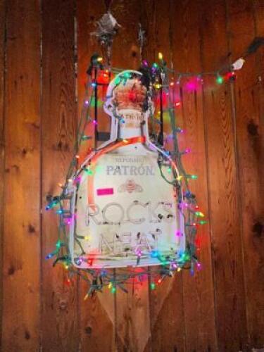 DESCRIPTION PATRON NEON SIGN W/ STRAND LIGHTS, ADDITIONAL INFORMATION NEON NOT WORKING, LOCATION TIKI BAR QTY 1