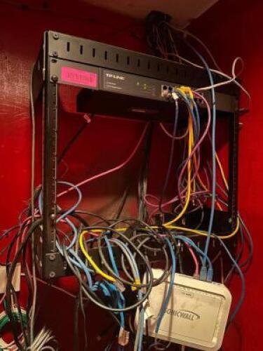DESCRIPTION TP-LINK ELECTRONICS RACK W/ (2) ROUTERS. LOCATION MAIN BAR QTY 1