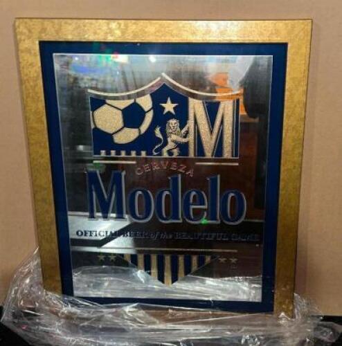 DESCRIPTION (2) MODELO BAR MIRRORS ( NEW ) THIS LOT IS: SOLD BY THE PIECE LOCATION VIP STAGE QTY 2