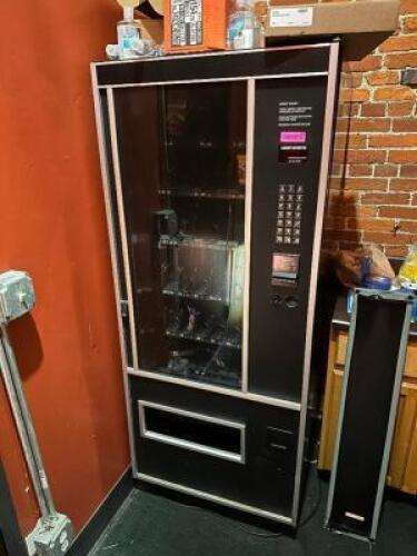 DESCRIPTION FSI SNACK FOOD VENDING MACHINE W/ DOLLAR BILL ACCEPTOR. ON SECOND FLOOR. ADDITIONAL INFORMATION NO KEY, SELLS USED FOR $1350-$1600 LOCATIO
