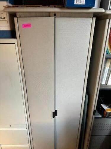 DESCRIPTION 24" TWO DOOR METAL STORAGE CABINET THIS LOT IS: W/ CONTENTS LOCATION OFFICE QTY 1