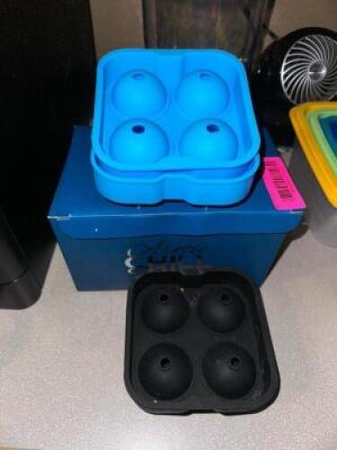 DESCRIPTION (3) RUBBER ICE CUBE MOLDS. LOCATION OFFICE QTY 1