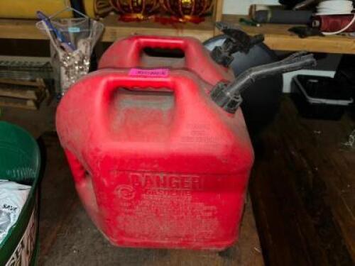 DESCRIPTION (2) RED PLASTIC GAS CANS LOCATION WAREHOUSE QTY 1
