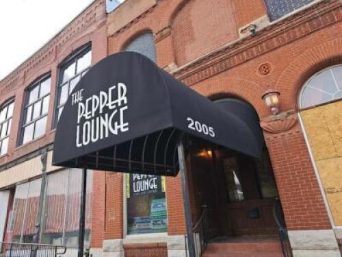 DESCRIPTION "THE PEPPER LOUNGE" BLACK CANVAS AWNING COVER. FRAME AND POSTS ARE NOT INCLUDED AND MUST STAY WITH THE BUILDING. ADDITIONAL INFORMATION AP