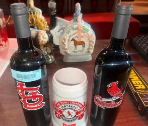 DESCRIPTION (2) CARDINALS COLLECTABLE WINE BOTTLES AND (1) BEER STEIN THIS LOT IS: ONE MONEY LOCATION MAIN BAR QTY 1