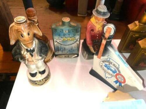 DESCRIPTION (1) LOT OF 5 ASSORTED COLLECTABLE BOTTLES AND DECANTERS. ADDITIONAL INFORMATION EMPTY THIS LOT IS: ONE MONEY LOCATION MAIN BAR QTY 1