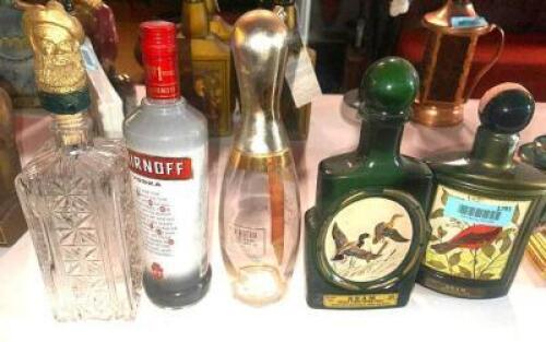 DESCRIPTION (1) LOT OF 5 ASSORTED COLLECTABLE BOTTLES AND DECANTERS. ADDITIONAL INFORMATION EMPTY THIS LOT IS: ONE MONEY LOCATION MAIN BAR QTY 1