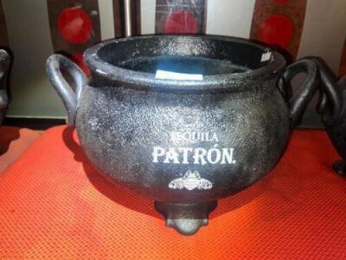 DESCRIPTION PATRON HEAVY DUTY PLASTIC CAULDRON BOTTLE PRESENTER. LOCATION MAIN BAR QTY 1