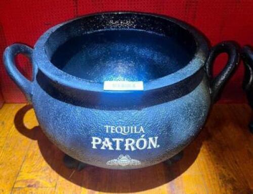 DESCRIPTION (2) PATRON HEAVY DUTY PLASTIC CAULDRON BOTTLE PRESENTERS. THIS LOT IS: SOLD BY THE PIECE LOCATION MAIN BAR QTY 2