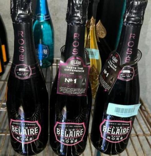 DESCRIPTION (3) BOTTLES OF BELAIR ROSE CHAMPAGNE LOCATION KITCHEN QTY 3