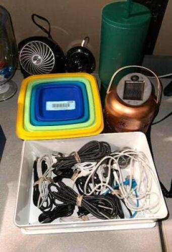 DESCRIPTION (1) LOT OF ASSORTED SMART PHONE CORDS, FAN, TERVIS AND MISC. THIS LOT IS: ONE MONEY LOCATION OFFICE QTY 1
