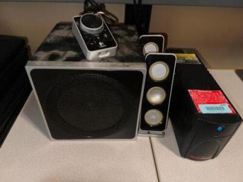 DESCRIPTION LOGITECH SUBWOOFER AND (2) SPEAKERS. ADDITIONAL INFORMATION W/ BATTERY BACK UP. LOCATION OFFICE QTY 1