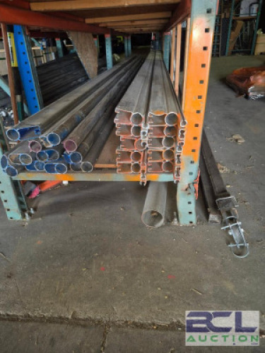 10 - ORANGE POLES (21FT. 10FT. ): 9 W/TRACK & 1 W/O TRACK #93