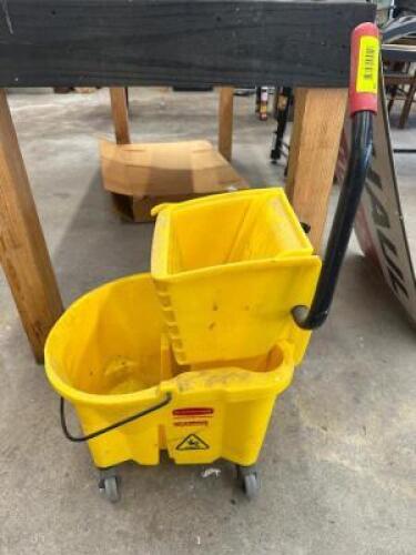 YELLOW MOP BUCKET AND WRINGER.