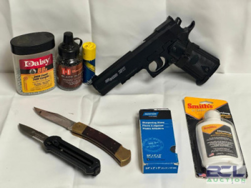 SIG SAUER 1911 BB PISTOL WITH ADDITIONAL AMMO, TWO HUNTING KNIVES, SHARPENING STONE AND SOLUTION