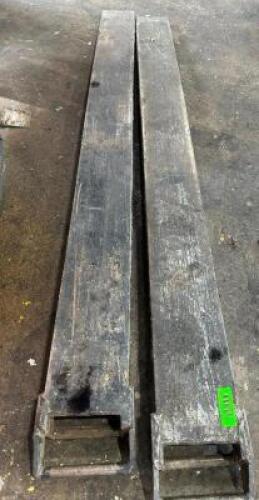 (1) SET OF HEAVY DUTY 60" FORK EXTENSIONS.