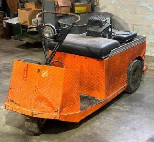 DESCRIPTION: BUGGY CART BRAND/MODEL: TAYLOR DUNN INFORMATION: COMES WITH CHARGER, NOT IN WORKING CONDITION LOCATION: WAREHOUSE QTY: 1