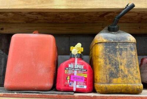 DESCRIPTION: (3) GAS CANS LOCATION: BACK WAREHOUSE QTY: 3