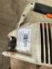 DESCRIPTION: STIHL GAS POWERED AUGER LOCATION: BACK WAREHOUSE QTY: 1 - 4