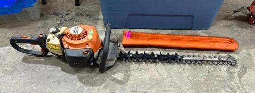DESCRIPTION: GAS HEDGE TRIMMER WITH PROTECTIVE SLEEVE BRAND/MODEL: STIHL HS B1T LOCATION: BACK WAREHOUSE QTY: 1